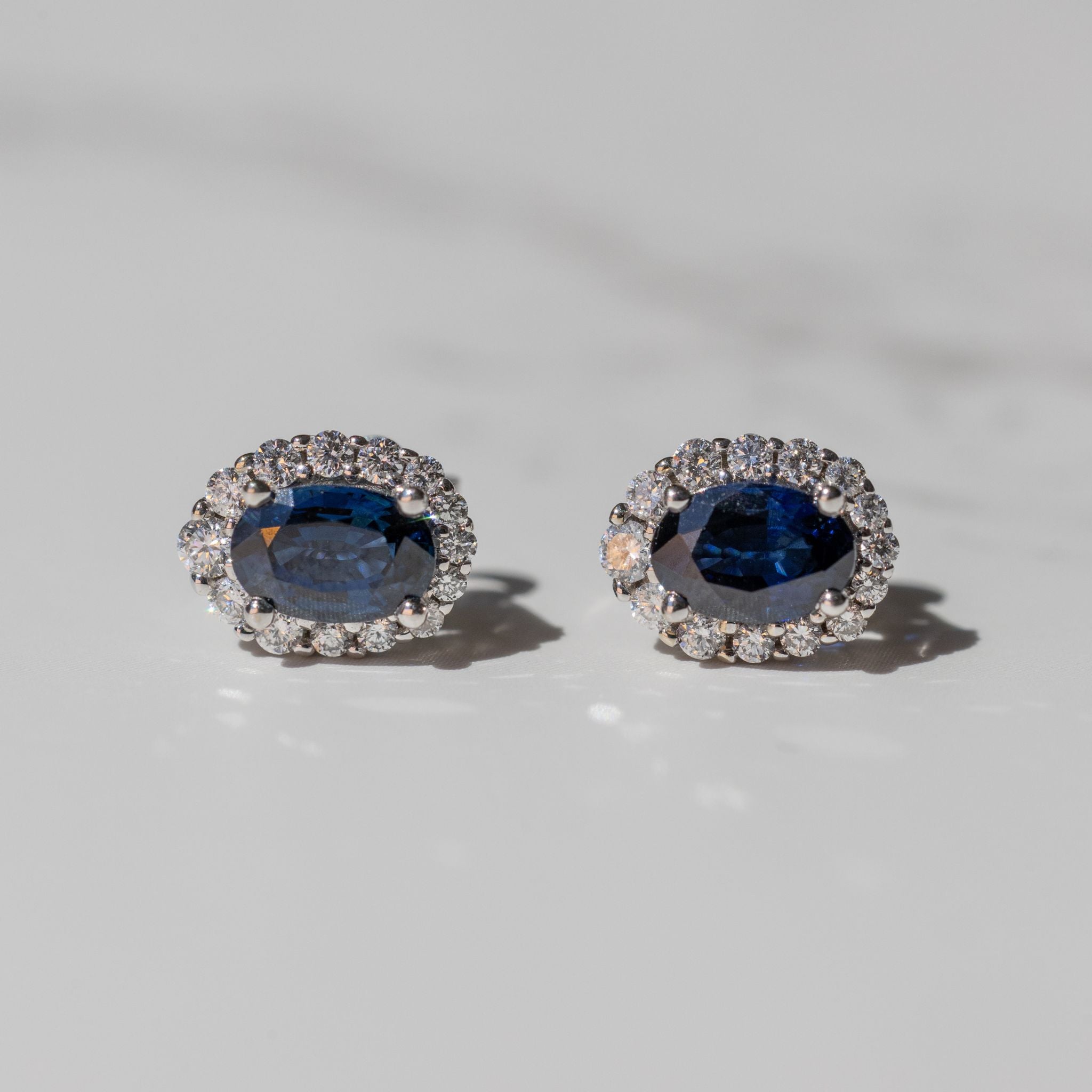 14K white gold natural sapphire and diamond stud lifestyle