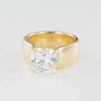 An engagement ring setting with an 8mm cigar band and a lowset cathedral setting