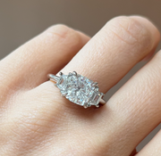 3-Stone Cushion Cut Engagement Ring with Trapezoid Side Stones