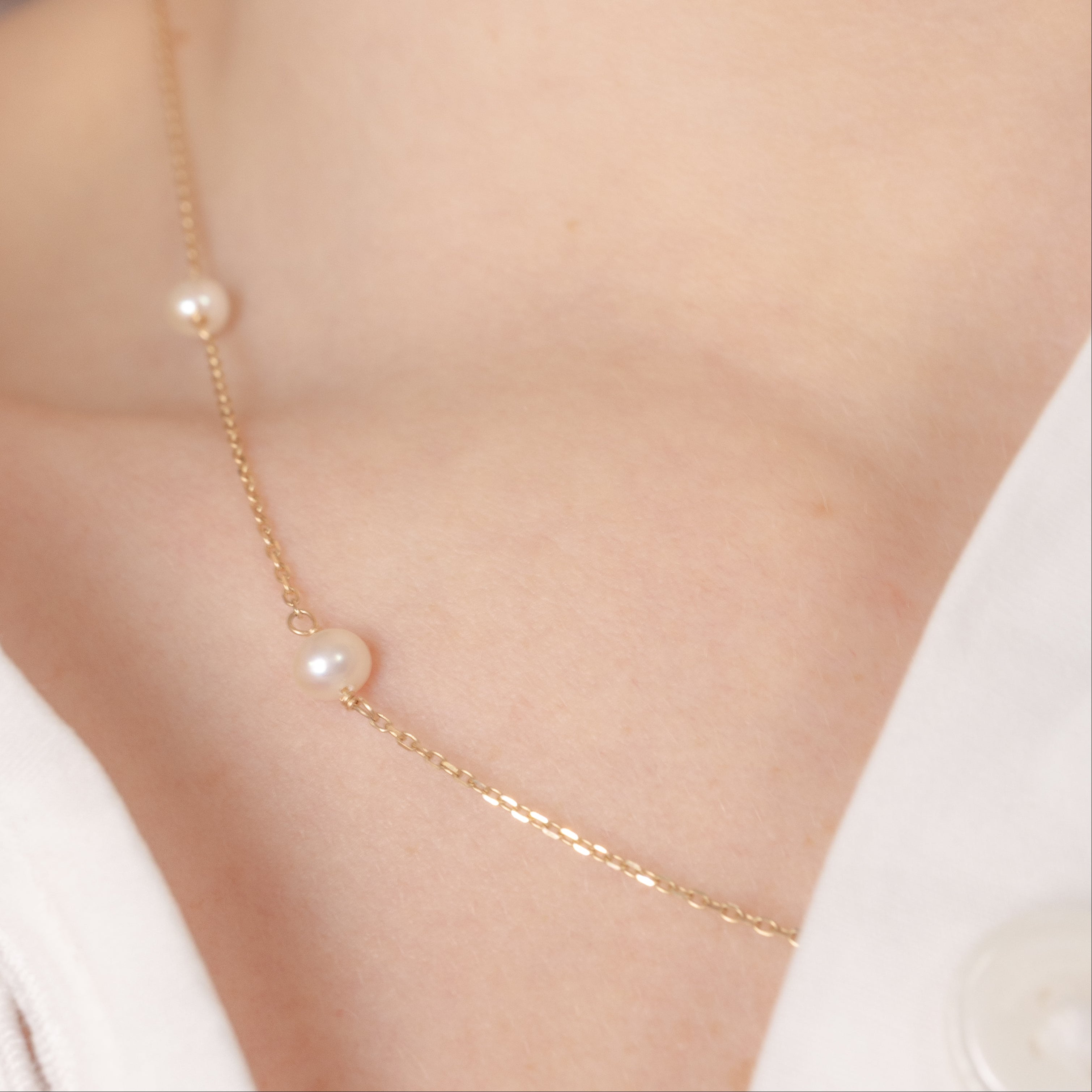 hitched 14k yellow gold freshwater cultured pearl station necklace with 9 4mm pearls model