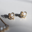 gold and pearl bow stud earrings lifestyle