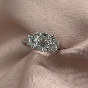 3-Stone Cushion Cut Engagement Ring with Trapezoid Side Stones