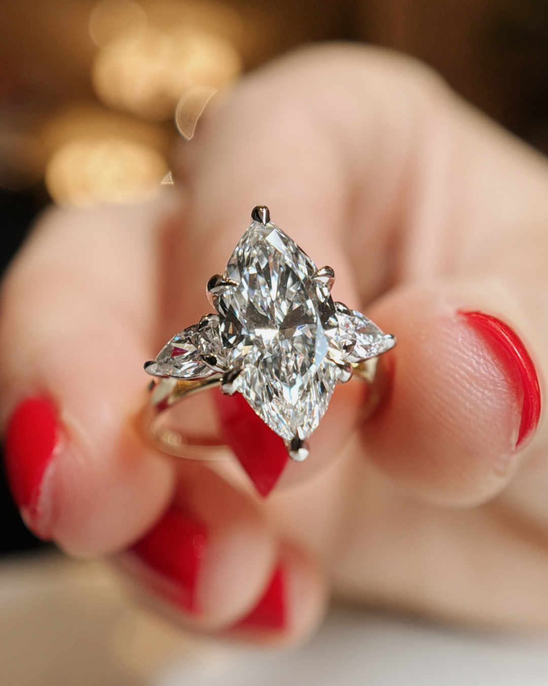 Marquise and Pear Three Stone Engagement Ring