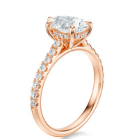 Signature Cathedral Hidden Halo Pear Engagement Ring - Rose Gold Pavé Band - Side View