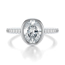 Signature Bezel Oval Engagement Ring - White Gold Pavé Band - Front View