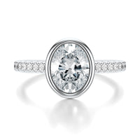 Signature Bezel Oval Engagement Ring - White Gold Pavé Band - Front View