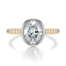 Signature Bezel Oval Engagement Ring - Two-Tone Pavé Band - Front View
