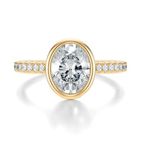 Signature Bezel Oval Engagement Ring - Yellow Gold Pavé Band - Front View