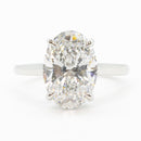 hitched platinum signature cathedral engagement ring with hidden halo and oval center