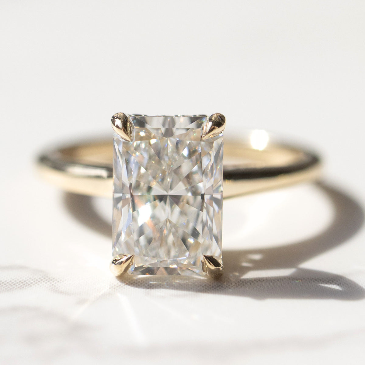 radiant-cut-yellow-gold-solitaire-engagement-ring.jpg