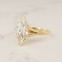 front view of a split-shank filigree and milgrain engagement ring