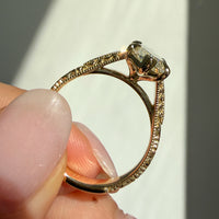 profile view of a split-shank filigree and milgrain engagement ring