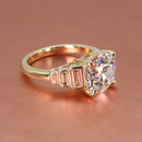 Tapered bezel setting flanked by bezel-set lab-grown baguette diamonds