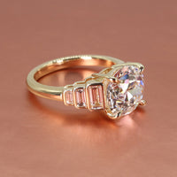 Tapered bezel setting flanked by bezel-set lab-grown baguette diamonds