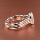 Side profile of a chunky metal tapering engagement ring setting with a double band