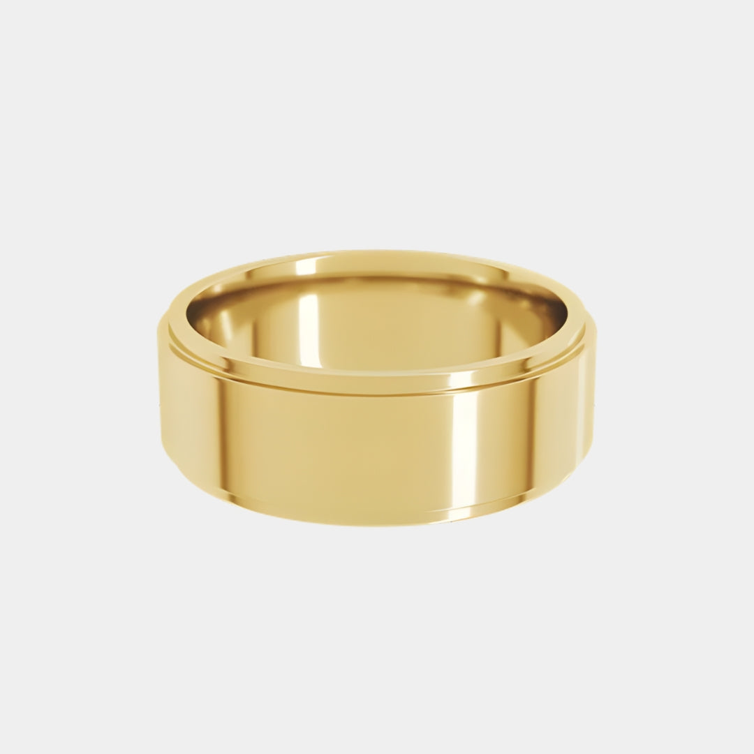 hitched men's yellow gold stepped edge wedding band in 7mm width