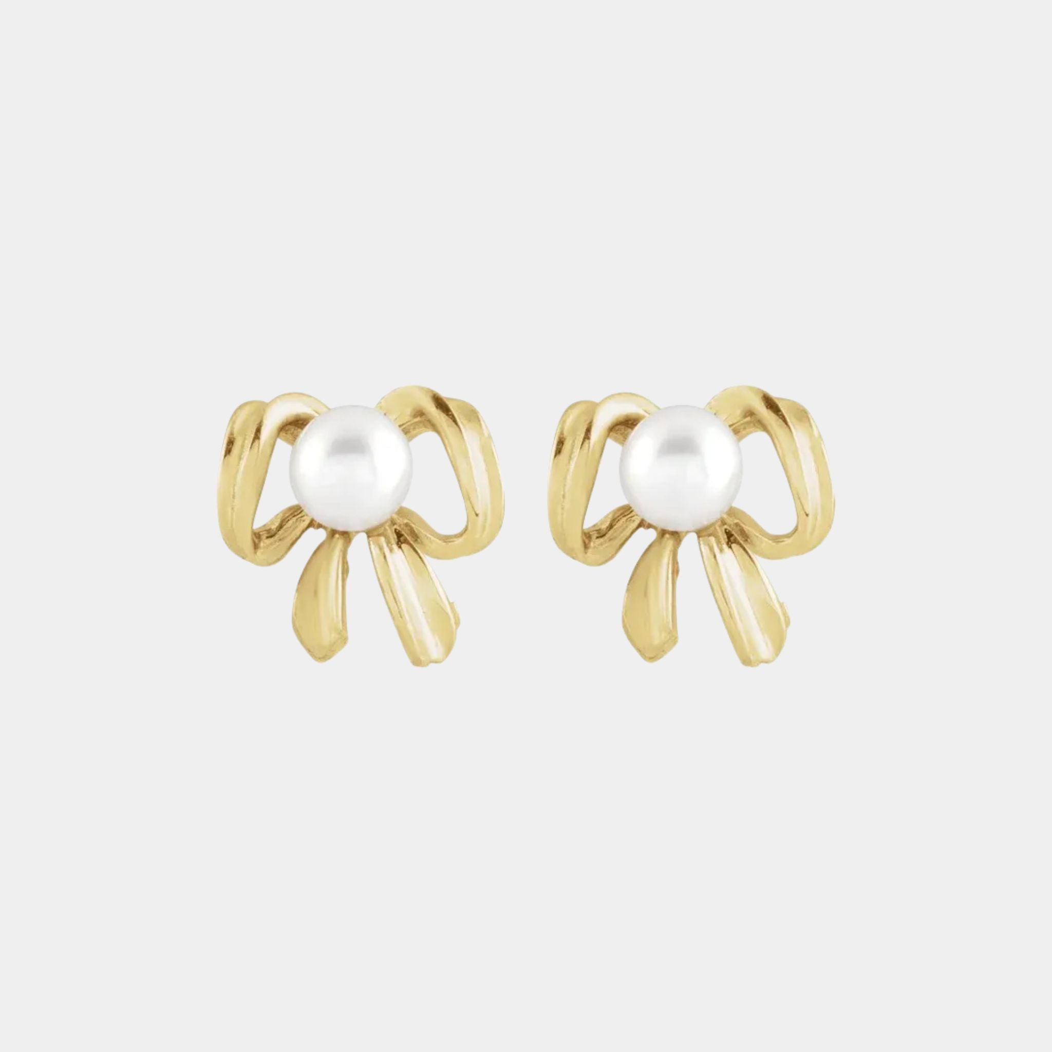yellow gold pearl bow stud earrings