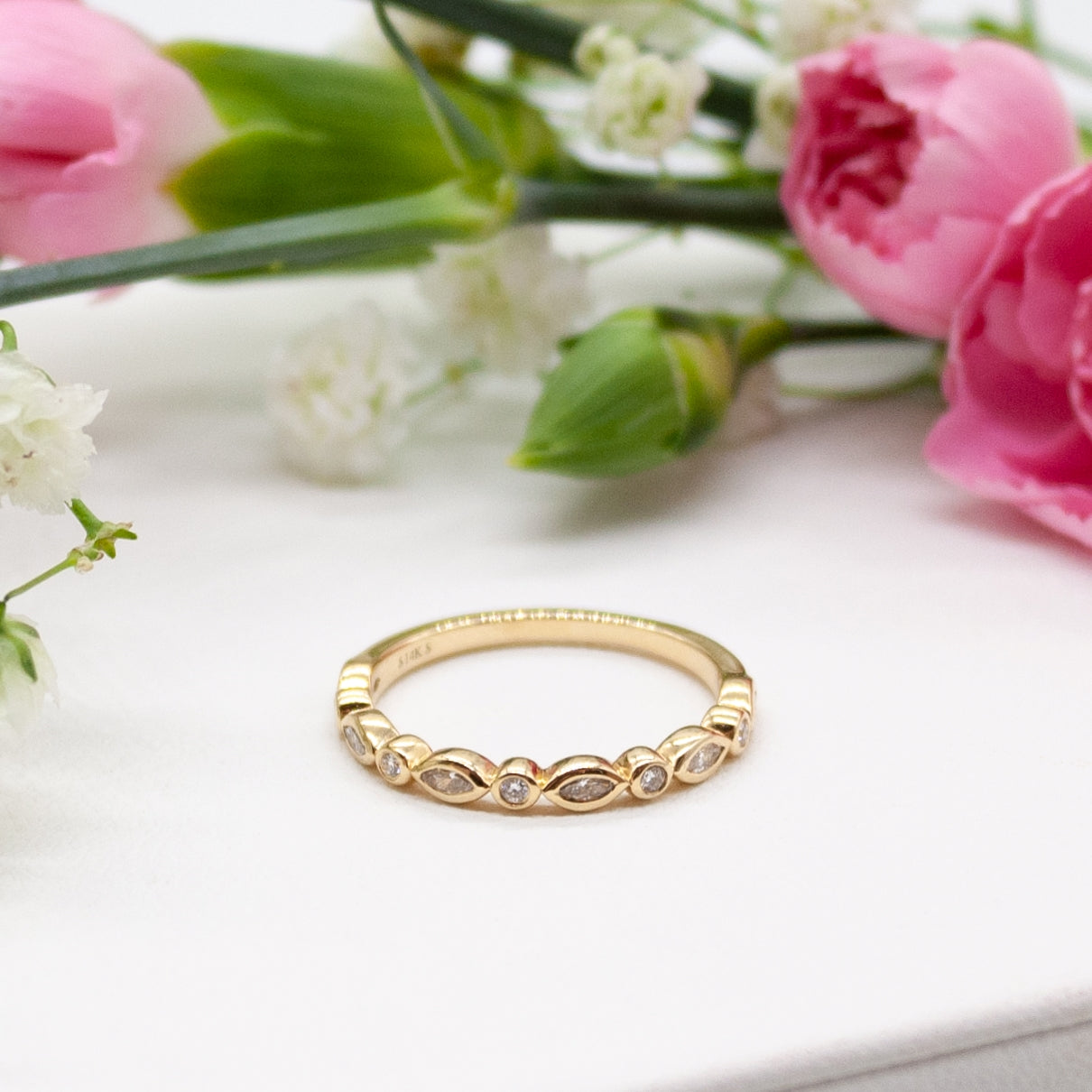 The Gold Alternating Bezel