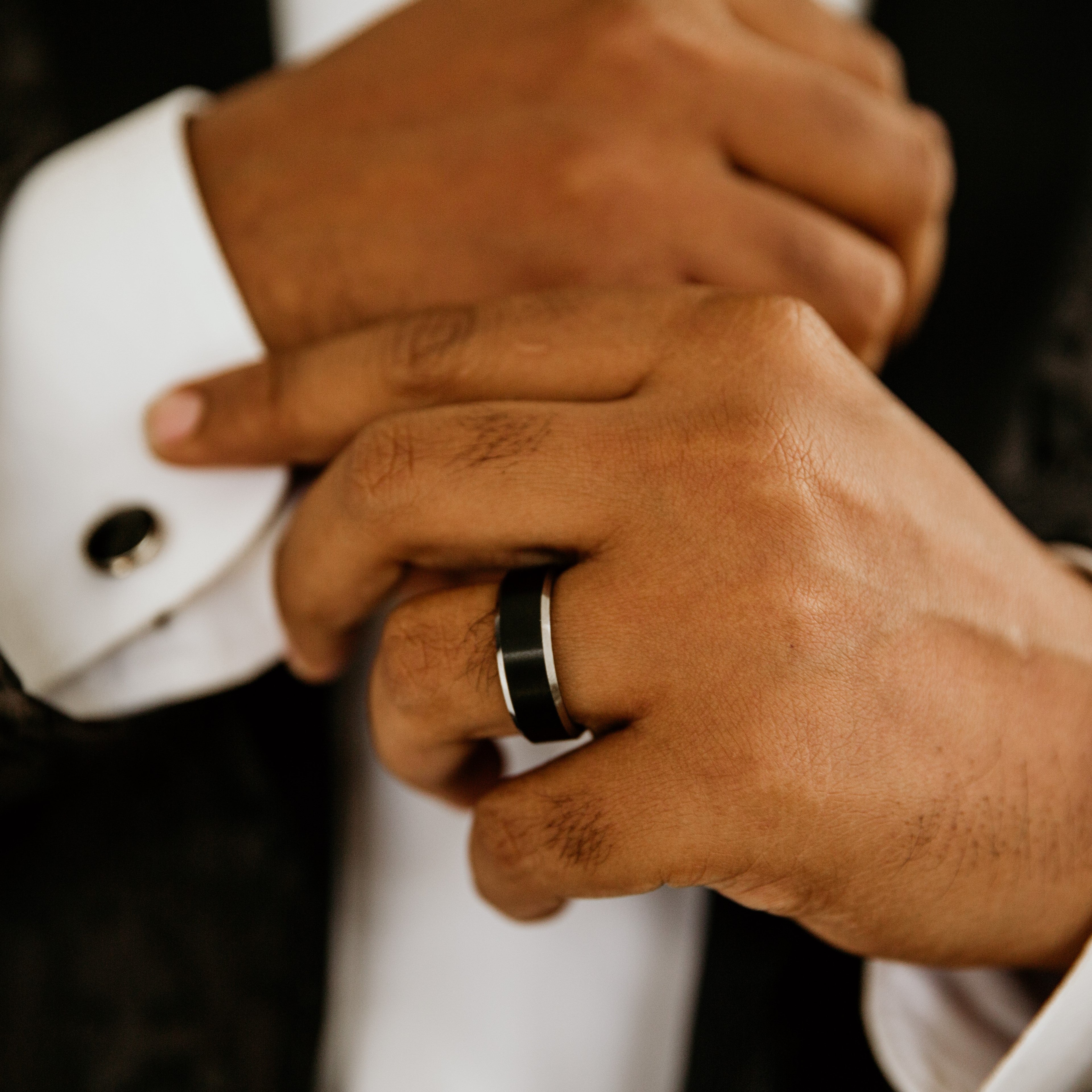 black and silver tungsten ring