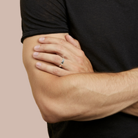 hitched men's white gold flat wedding band in a 4mm width on model