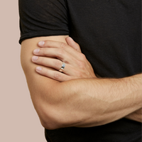 hitched men's white gold flat wedding band in a 6mm width on model